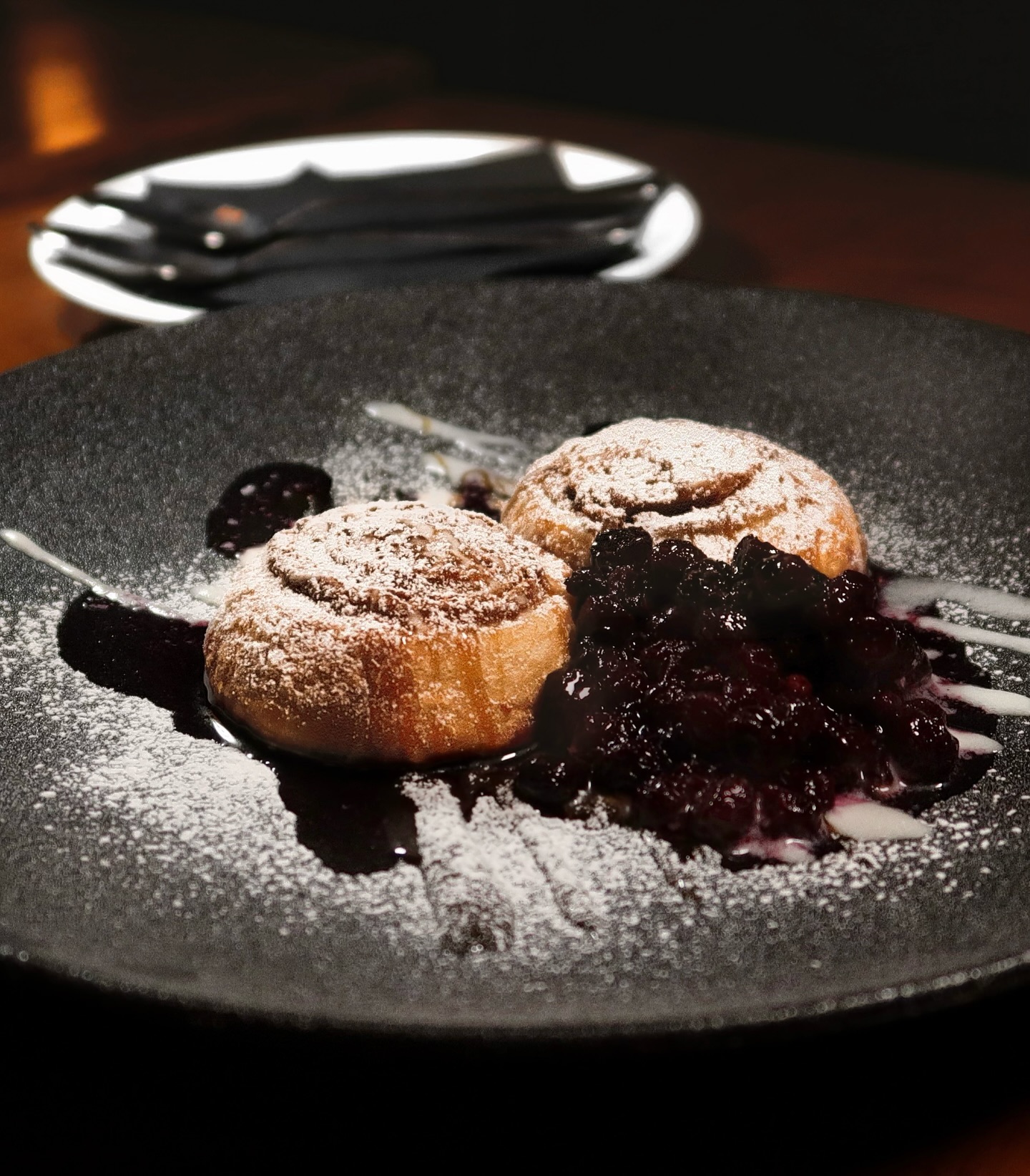 Dumplings with herbs, soy sauce, and chili oil at Somewhere Dine Bar
