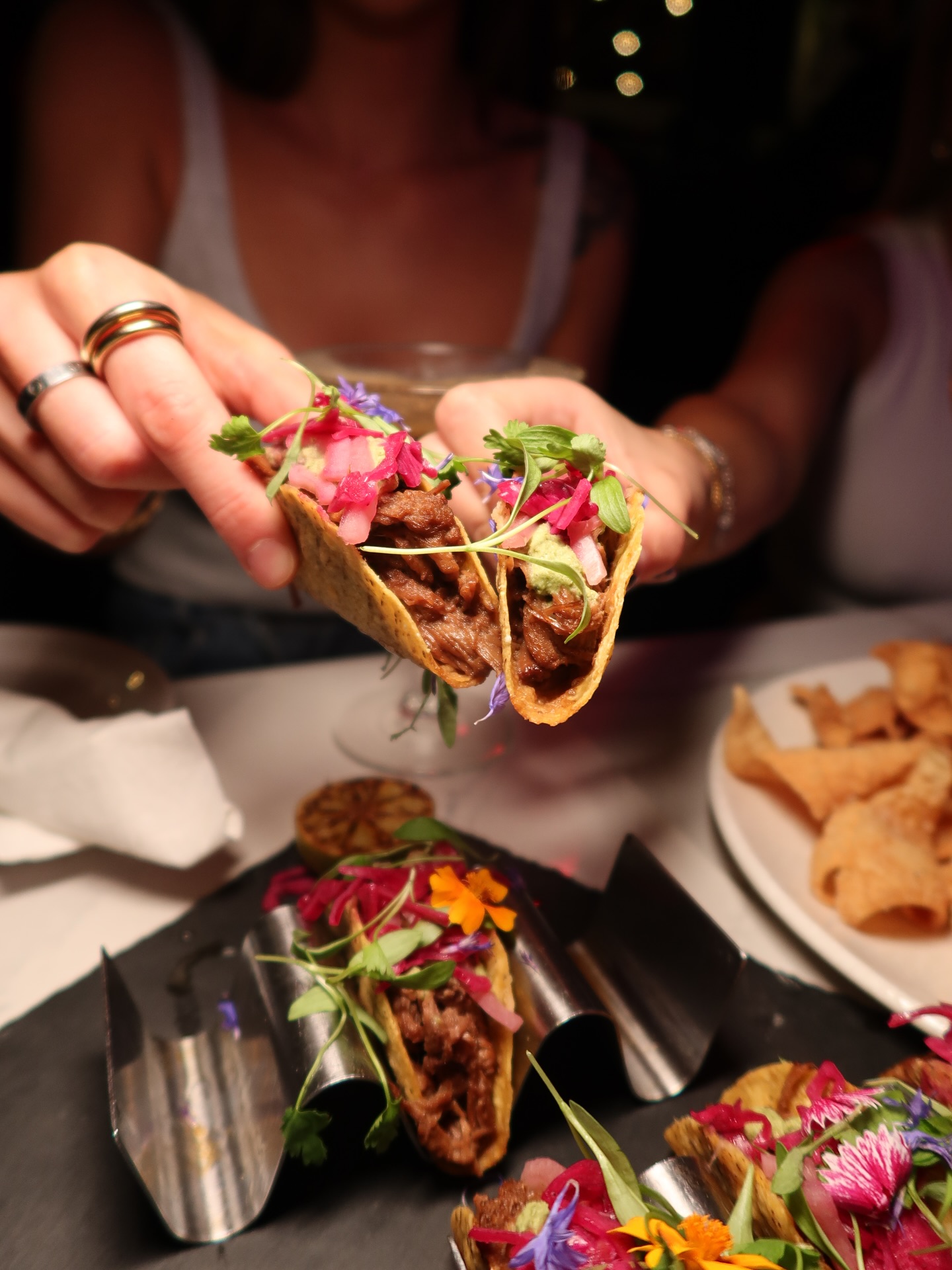 Baked macaroni and cheese in a skillet at Somewhere Dine Bar