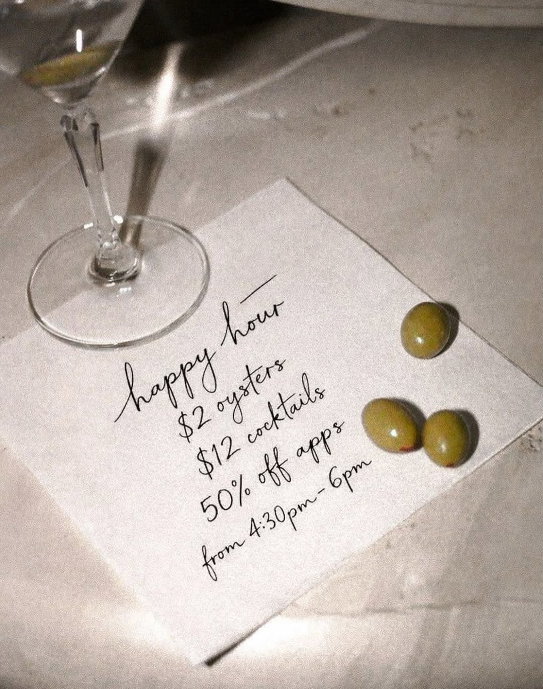 Happy hour drinks at the bar at Somewhere Dine Bar, Ottawa