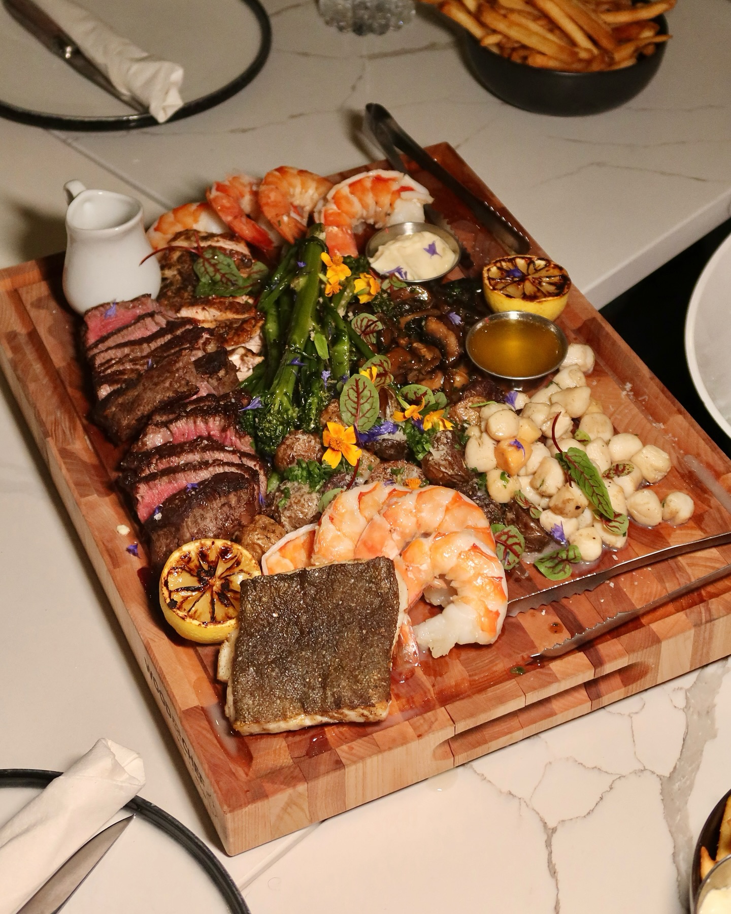 Seasonal mains and sides from the kitchen at Somewhere Dine Bar